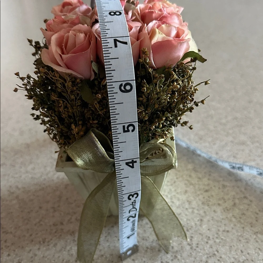 Decorative Floral Arrangement Pink Roses in a green planter box